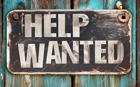 Premium Photo | Help wanted sign