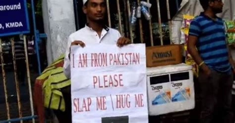 YouTuber Holds ‘I'm From Pakistan, Please Hug Me/Slap Me’ Poster In ...