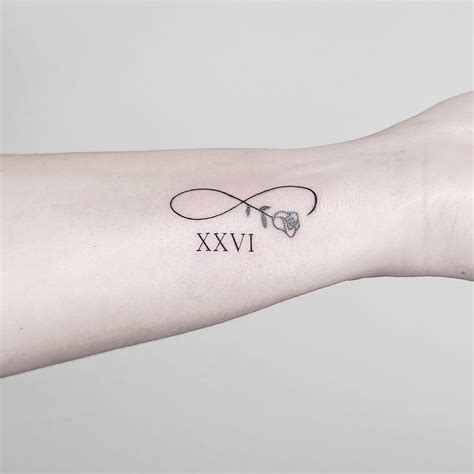 29 Timeless Roman Numeral Tattoos That Celebrate Your Story - Sacred Joanne