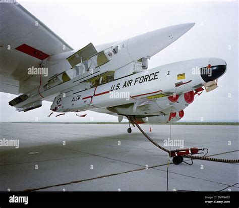 A close-up view of an AGM-86 air-launched cruise missile loaded on a B ...