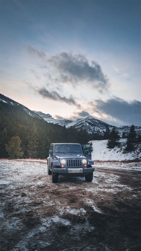 Download wallpaper 800x1420 jeep, car, suv, gray, snow, mountains ...