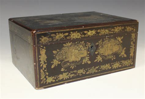 A Chinese export lacquer tea caddy, 19th Century, of rectangular form ...