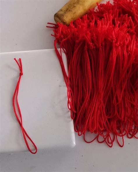 Image result for Tag Stringing Machine