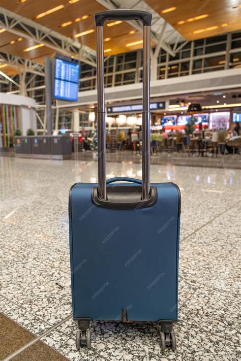 Premium Photo | Hand luggage at airport terminal check in luggage ...