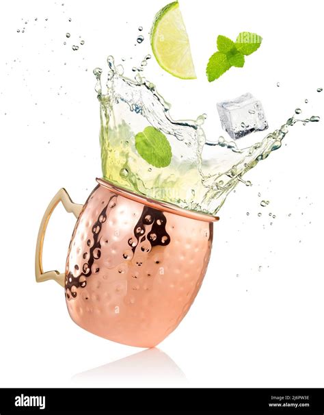 splashing moscow mule cocktail in copper mug isolated Stock Photo - Alamy