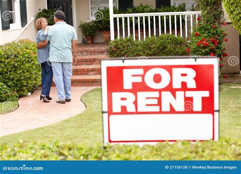 Senior Hispanic Couple Renting New Home Stock Photo - Image of outdoors ...