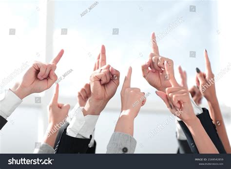 Group of People Standing in Office Pointing 的图像结果