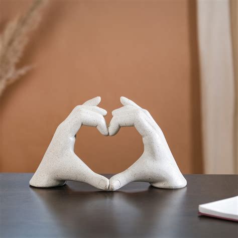 Love Heart Hands Resin Showpiece- Unique Showpiece Online | Nestasia