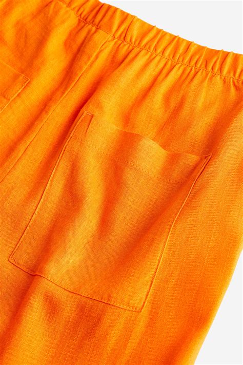 Linen-blend pull-on trousers - Orange - Ladies | H&M IN