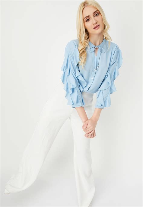 Buy Women Ruffled Tie-Up Neck Blouse with Camisole Online at just Rs ...