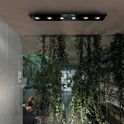 Ceiling light with flat glass plate with lowerings
