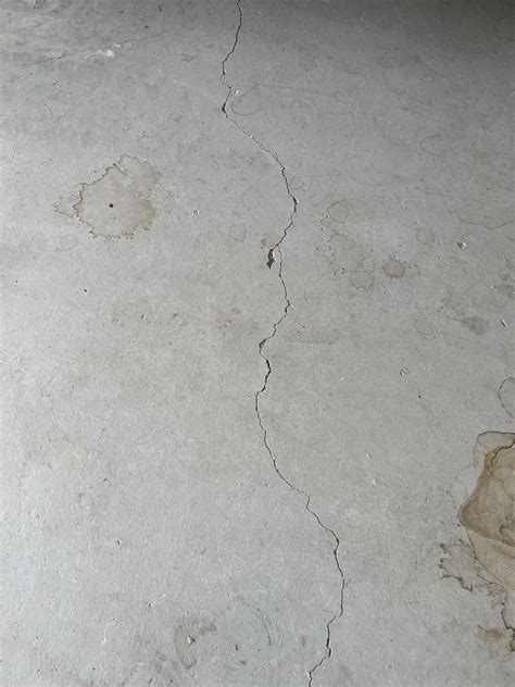 Crack in garage floor, it seems to be getting bigger but I’m not sure ...