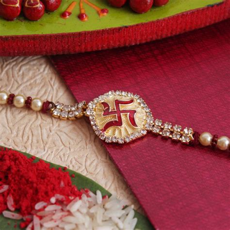 Rakhi :: Type :: American Diamond Rakhi :: Swastika Sterling Rakhi