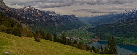 Download wallpaper 2560x1024 mountains, rocks, slope, grass, sky ...