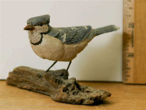 At Auction: vintage carved wooden bird sculpture