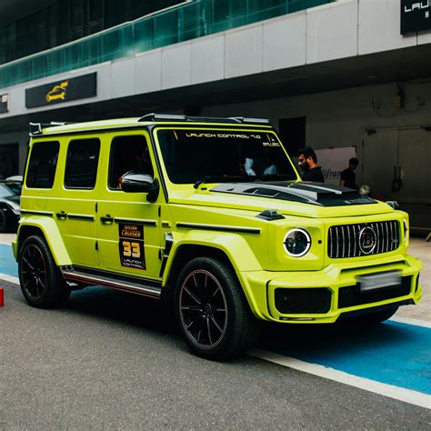 Lime Green SUV at Auto Expo in Greater Noida · Free Stock Photo