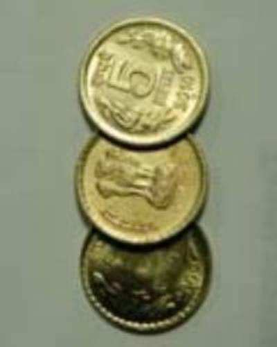 Golden 5-rupee coins in short supply before puja