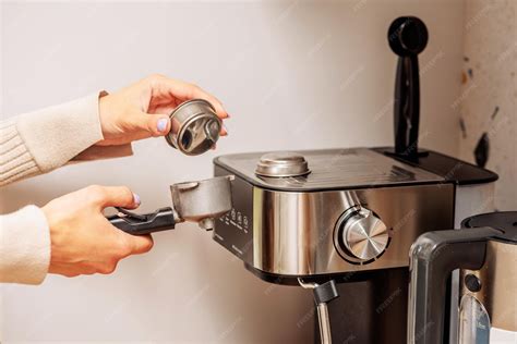 Premium Photo | The process of making coffee at home coffee machine ...