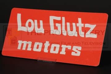 The Prop Gallery | Lou Glutz Motors licence plate