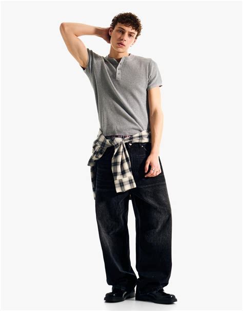 Embroidered barrel jeans - Men | Bershka