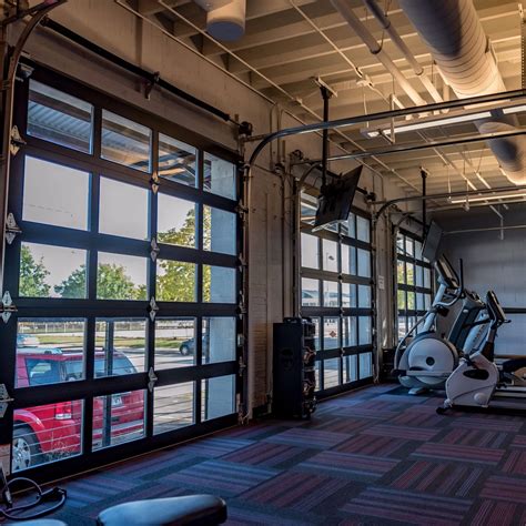 Gym with C.H.I. Full-View Aluminum Garage Doors#aluminum #chi #doors # ...