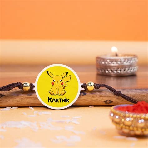 Wooden Rakhi | Personalised | Pikachu Name – ChitraChaya