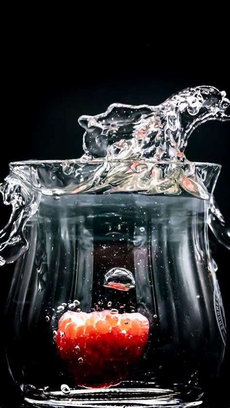 Download wallpaper 800x1420 raspberry, glass, water, splash, splatter ...