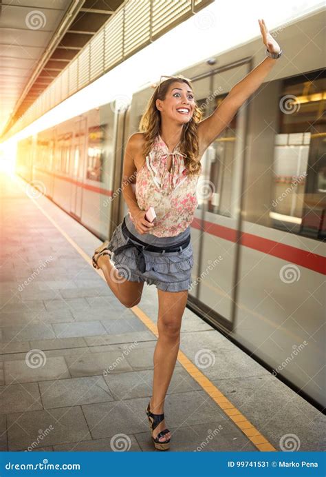 Beautiful Young Woman Running after a Train. Stock Image - Image of ...
