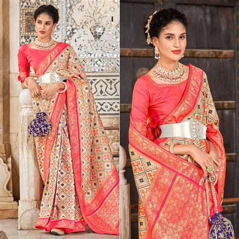 Chikoo Woven Art Silk Patola Saree With Tassels