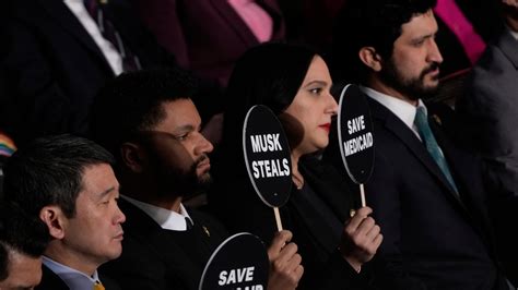 'This is not normal': Democrats protest Trump's address with signs