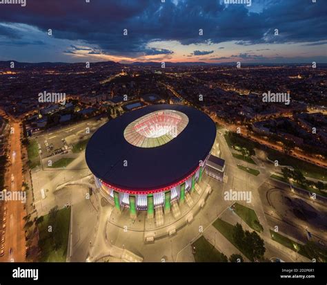 Amazing giant arena building in Hungary. illuminated Ferenc Puskas Stadium also known as Puskas ...