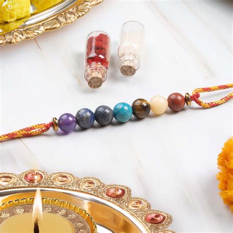 Mesmerize Rakhi Collection – 11 Chakra, Ruby & Spiritual Rakhis for ...