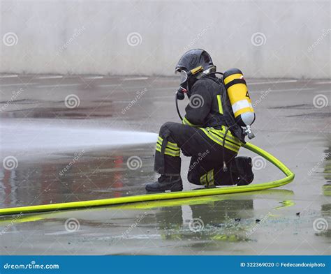 Firefighters Withbreathing Apparatus Oxygen Cylinders Spray Foam To Put ...