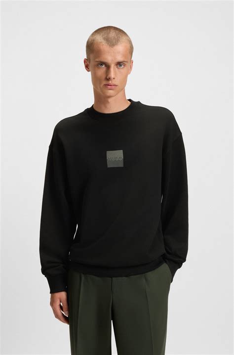 HUGO - Cotton-terry sweatshirt with split logo - Black