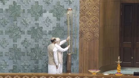 WATCH: PM Modi places sacred Sengol inside new Parliament House ...