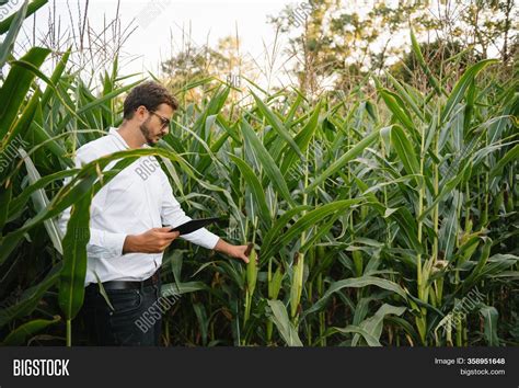 Young Agronomist Holds Image & Photo (Free Trial) | Bigstock