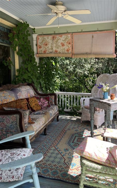 Screened Porch Design with Cozy Furniture and Rugs