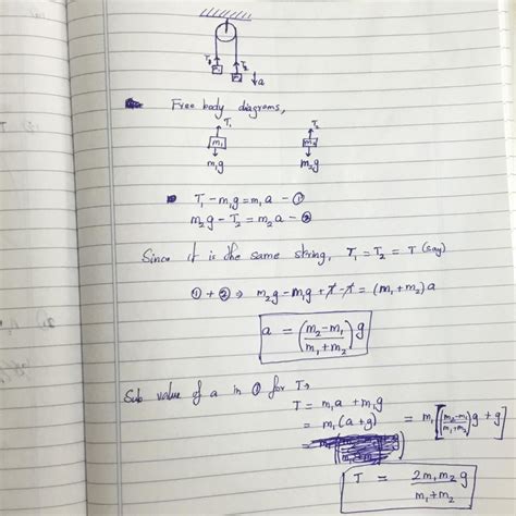 13: Figure shows a pulley of mass m and radius r with two blocks of ...