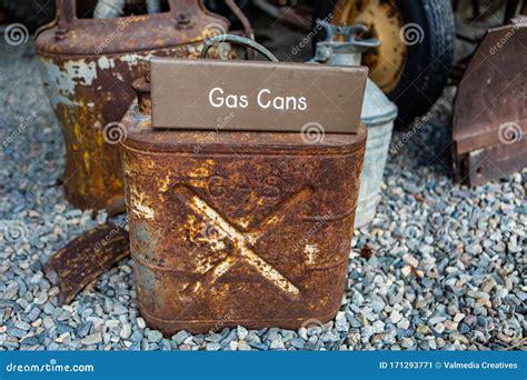 An Old Rustic and Grungy Gas Cans Editorial Photo - Image of container ...