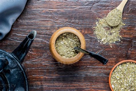 Composition of mate with yerba mate and teapot. Traditional drink from southern Latin America ...