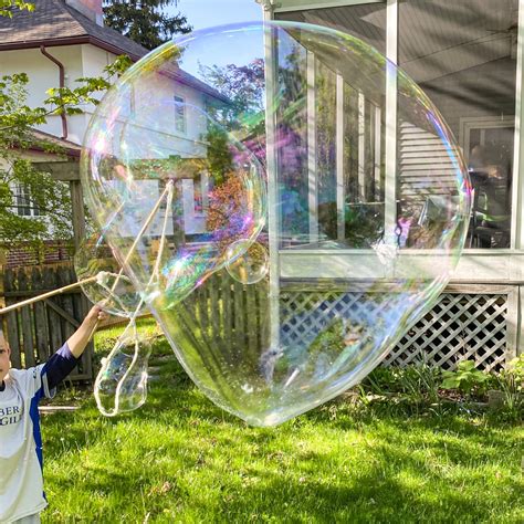 The Best Giant Soap Bubbles Recipe (+ DIY Bubble Wand)