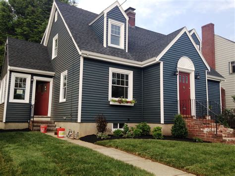 Red Brick House With Navy Door at Indiana Schneider blog