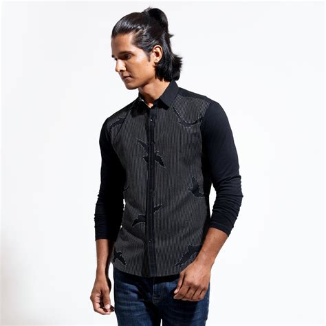 Long sleeve shirt with topstitch creating bird emb and jersey sleeves ...