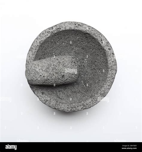 Traditional Mexican mortar and pestle. Molcajete made from volcanic ...
