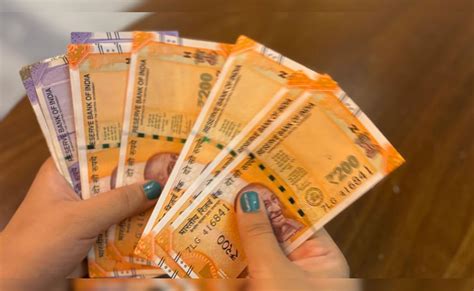 Rupee recovers from lowest level, gains 9 paise to 91.90 against US dollar