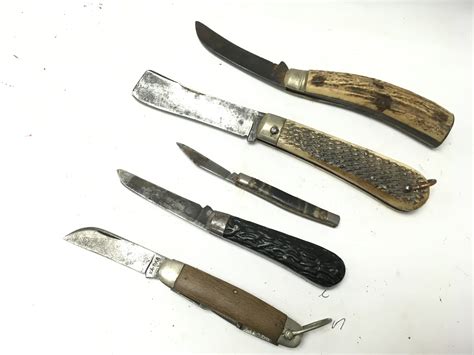 A collection of vintage pocket knives