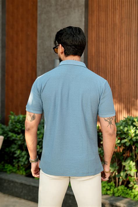 Gritstones Blue Self Design Zipper Polo Collar T-Shirt