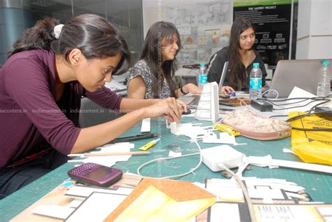 Buy Girl students of Raffles Design International is busy at their ...