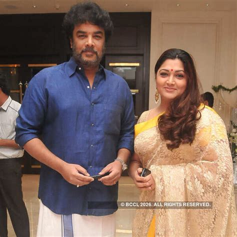 Sundar C and Khushboo pose as they arrive for the wedding reception ...