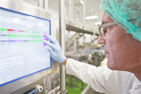 The Machine Operator Just Watching Another Machine Operator Working 的图像结果